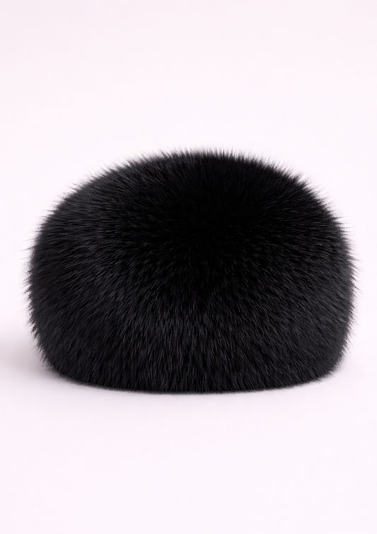 Black fur hat on a white background