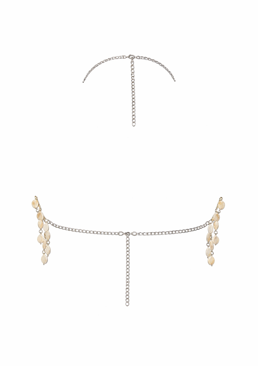 Bra with pearl-like beads on a white background