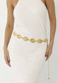 Load image into Gallery viewer, Gold belt with intricate design worn by a person in a white dress on a plain background