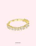 Заредете изображението в програмата за преглед на галерия, Gold ring with diamond-like stones on a light pink background
