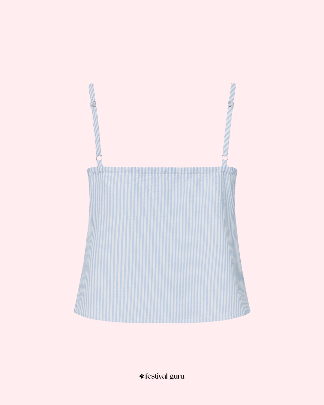Light blue striped camisole with thin straps on a pink background