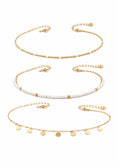 Заредете изображението в програмата за преглед на галерия, Set of three gold necklaces with different designs on a white background