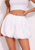 Load image into Gallery viewer, White lace skort worn by a person on a light background