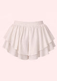 Load image into Gallery viewer, White shorts with ruffled layers on a light pink background