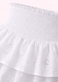 Заредете изображението в програмата за преглед на галерия, Close-up of a white ruffled skirt with eyelet details