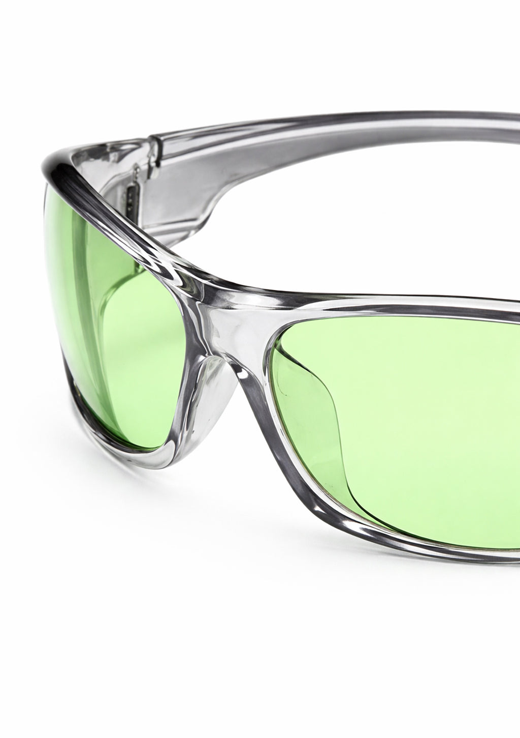 Close-up of clear frame and neon green lens wraparound sunglasses