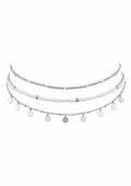 A three-layer silver beaded and chain necklace with small round disc charms, displayed against a solid white background.