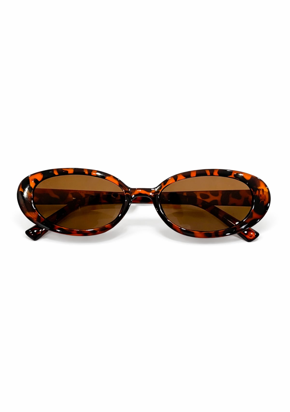 Animal print sunglasses with brown lenses on a white background