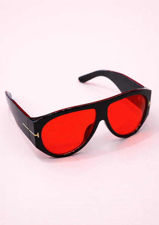 Black-framed sunglasses with red lenses on a white background