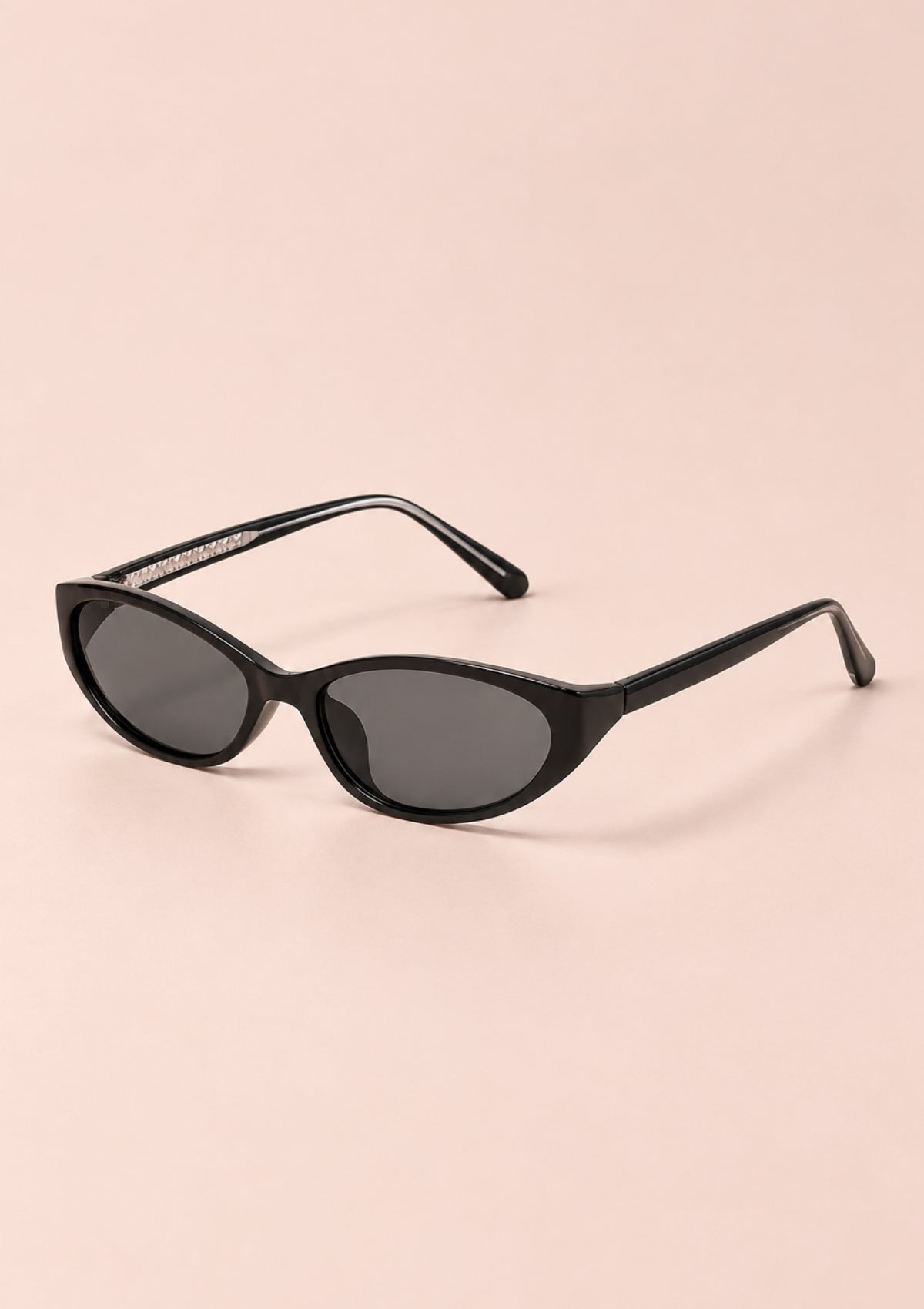 Black cat-eye sunglasses with slim frame and gradient lenses