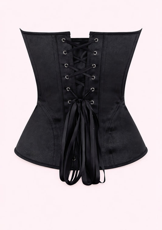 Black corset with lace-up front on a white background