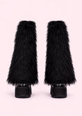 Заредете изображението в програмата за преглед на галерия, Black furry leg warmers on a light pink background

