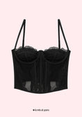 Load image into Gallery viewer, Black lace corset on a light pink background with 'festival guru' branding.
