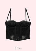 Black lace corset on a light pink background with 'festival guru' branding.