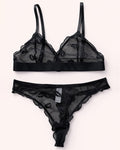 Black lace lingerie set on a white background