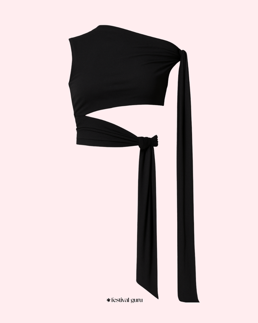 Black one-shoulder top with a long tie on a light pink background