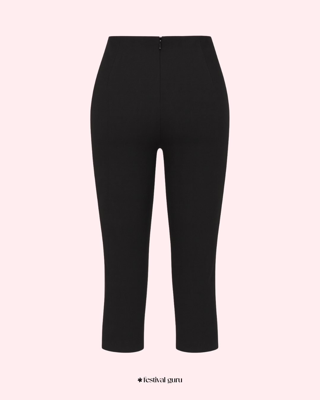 Black pants on a light pink background