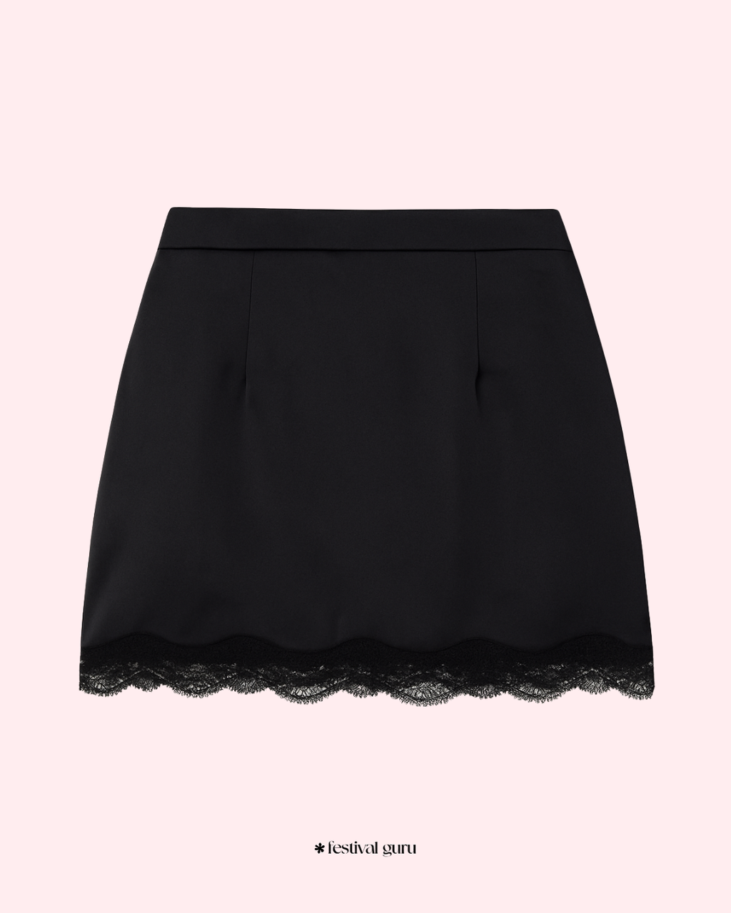 Black skirt with lace hem on a light pink background