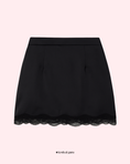 Заредете изображението в програмата за преглед на галерия, Black skirt with lace hem on a light pink background
