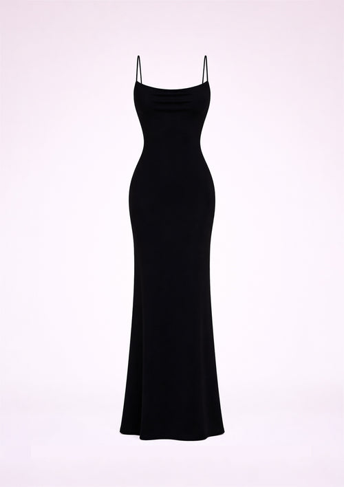 Black slip dress on a white background