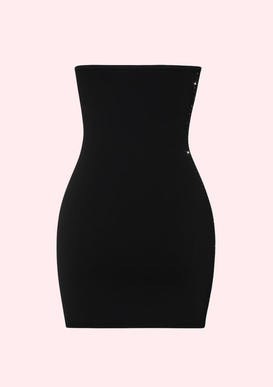 Black dress on a light pink background