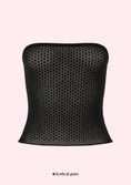 Заредете изображението в програмата за преглед на галерия, Black strapless top with rhinestone embellishments on a light pink background
