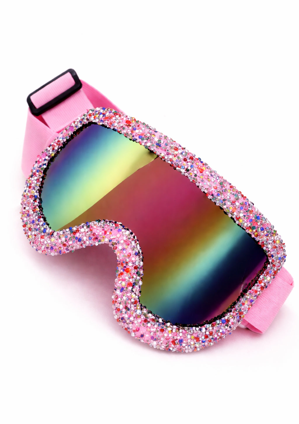 Colorful goggles with pink frame and multicolored gemstones on a white background