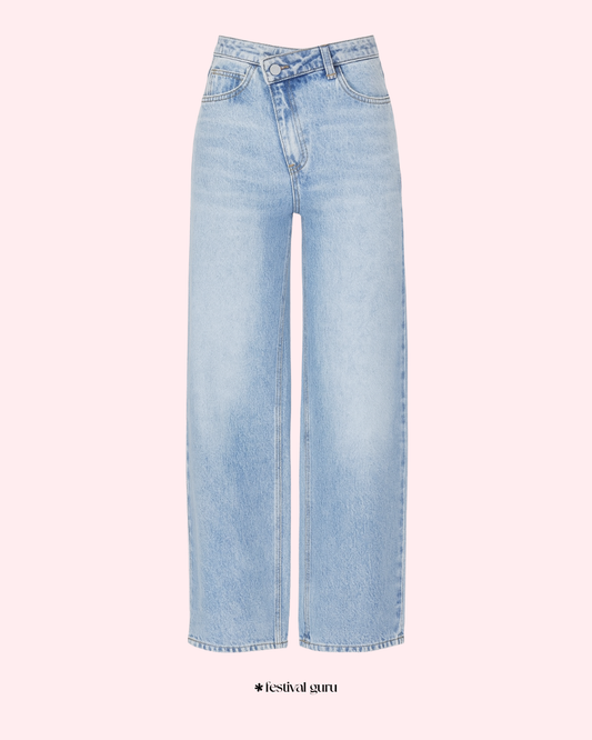 Light blue jeans on a pink background