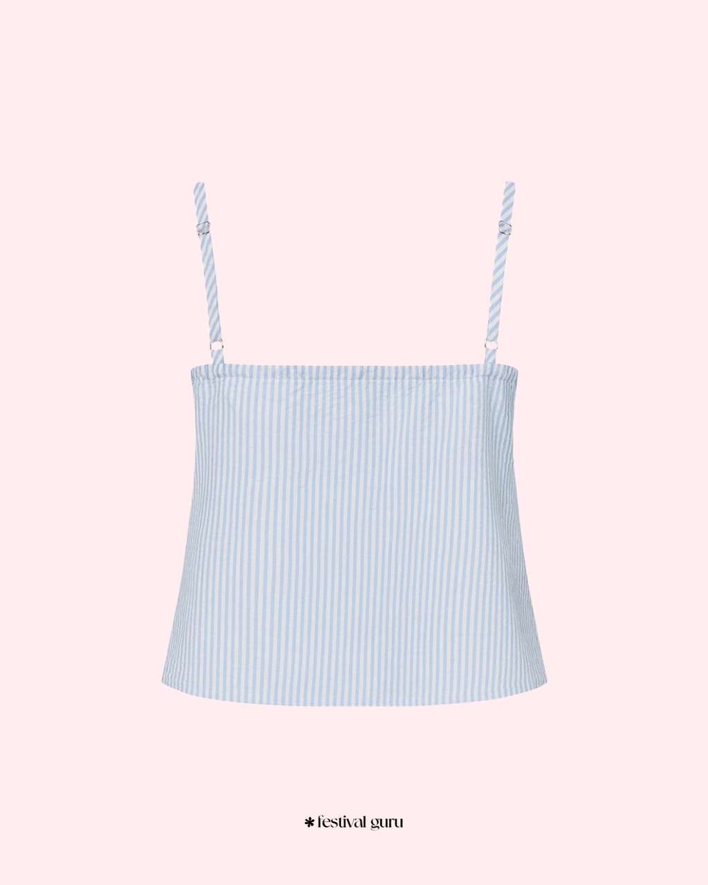 Light blue striped camisole with thin straps on a pink background