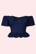 Заредете изображението в програмата за преглед на галерия, Navy blue off-shoulder top with ruffled details on a light pink background
