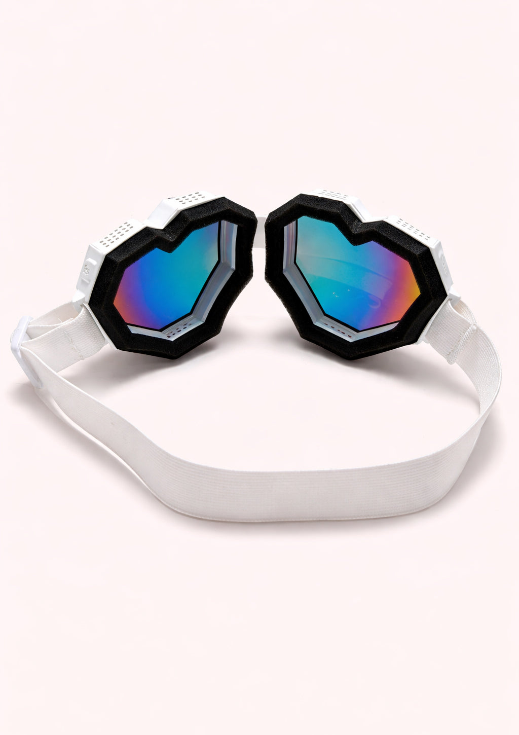 Pair of goggles with colorful lenses on a white background