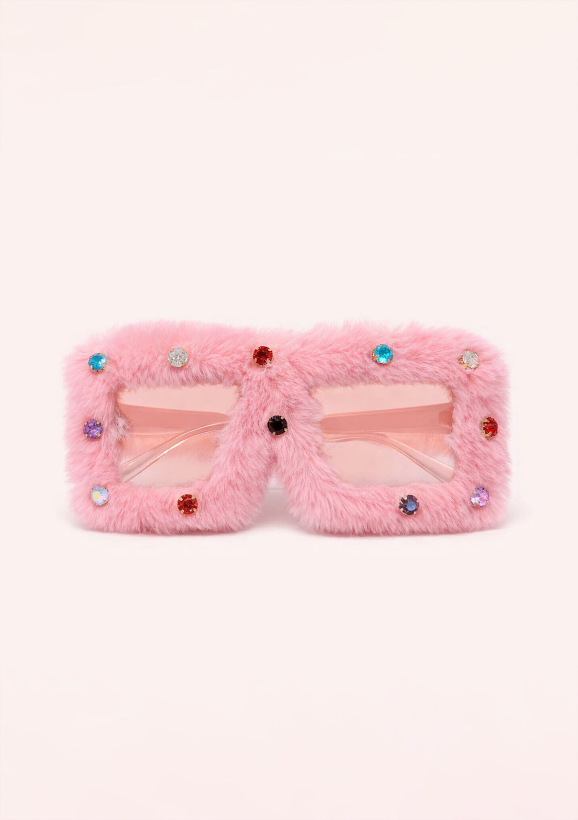 Pink fluffy sunglasses with decorative elements on a white background