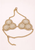 Gold chain top with floral designs on a white background