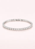 Заредете изображението в програмата за преглед на галерия, Silver bracelet with clear stones on a light pink background
