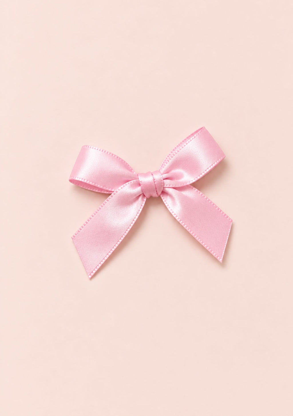 Six pink satin bows with long tails and a delicate sheen, arranged in three rows.