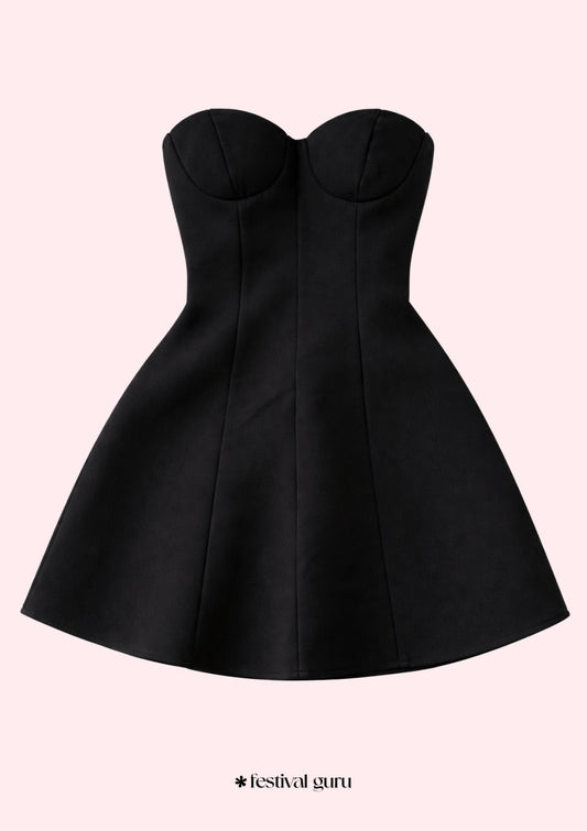 Black strapless dress on a light pink background with 'festival guru' branding.