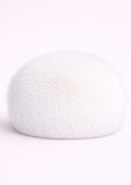 White textured hat on a white background