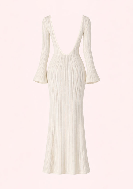 White pleated dress with long sleeves on a white background