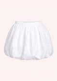 Load image into Gallery viewer, White skort with lace details on a pink background

