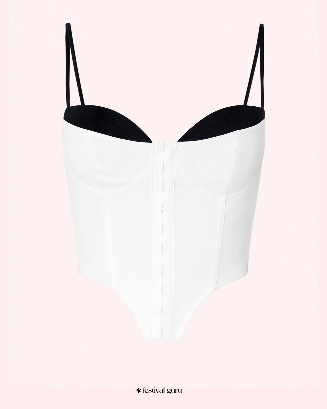White slip top with black lining on a pink gradient background