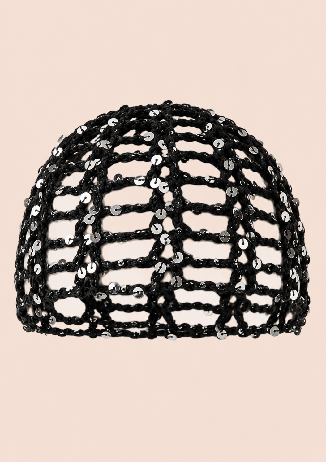 A black sequined mesh dome hat with an open lattice pattern, shown against a solid pale peach background.