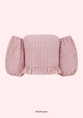 Red and white checkered off-shoulder top on a pink background