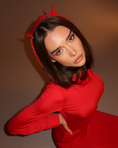 Заредете изображението в програмата за преглед на галерия, Woman wearing a red outfit with a red horn hairpins against a brown background
